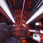 Interior of a luxury limousine with a bar.